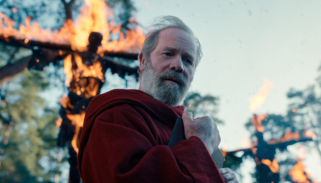 PETER MULLAN as FATHER CARDEN in episode 101 of CURSED Cr. COURTESY OF NETFLIX © 2020